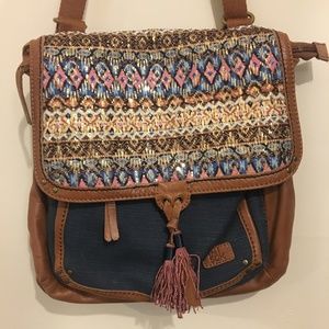 The Sak sequin backpack/side-bag